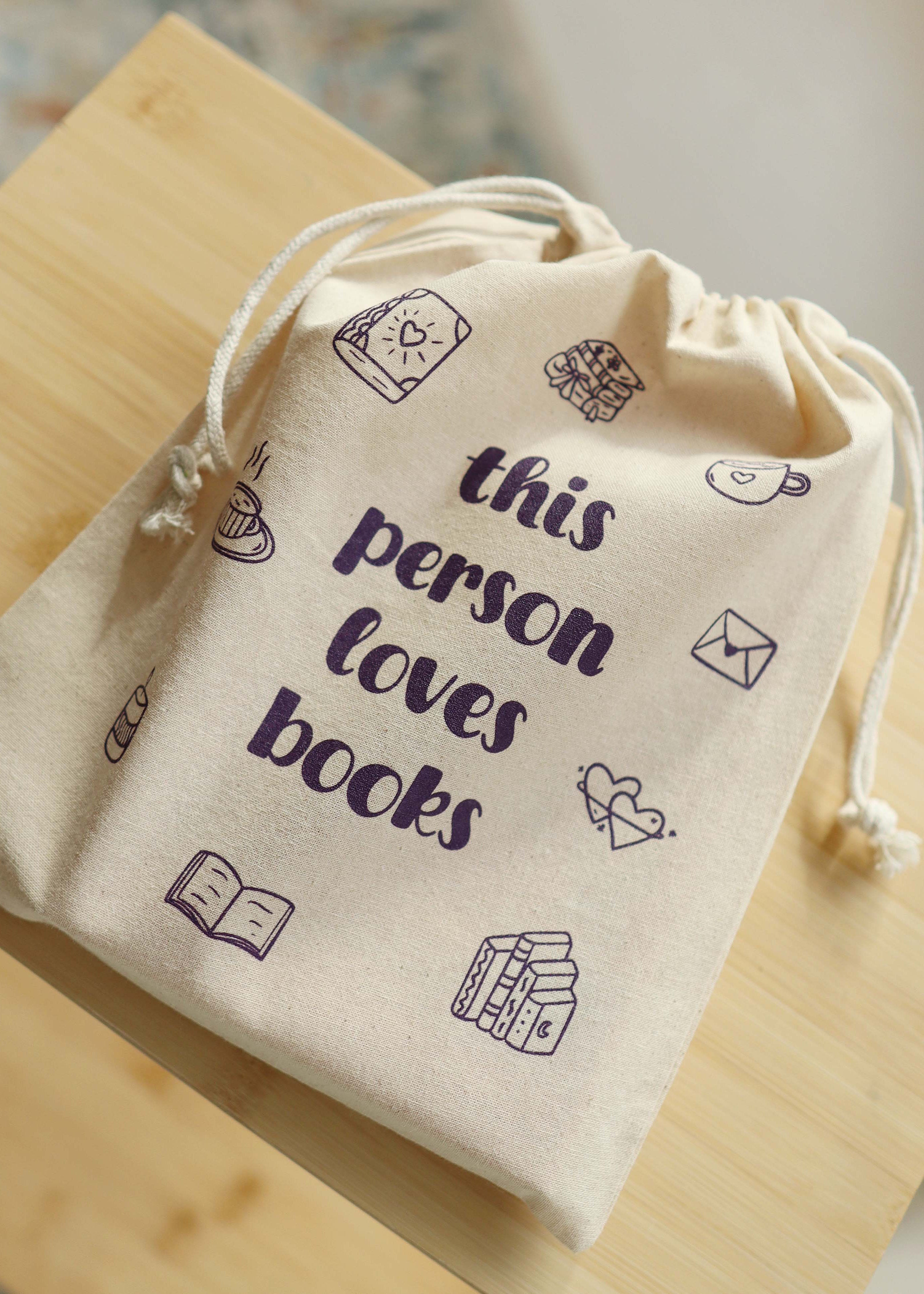 Booksleeve 'this person loves books' klein