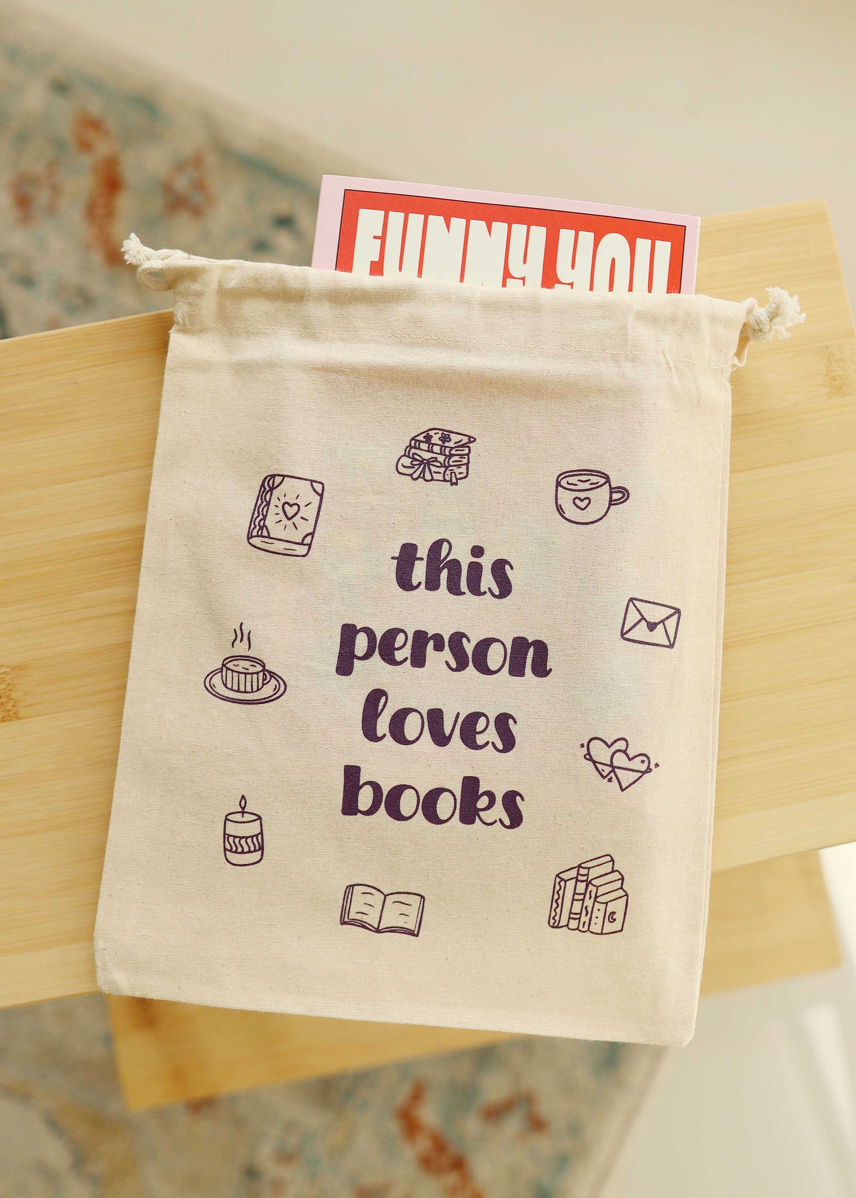 Booksleeve 'this person loves books' klein